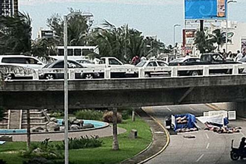 Arrojan 35 cuerpos torturados en una calle de Veracruz